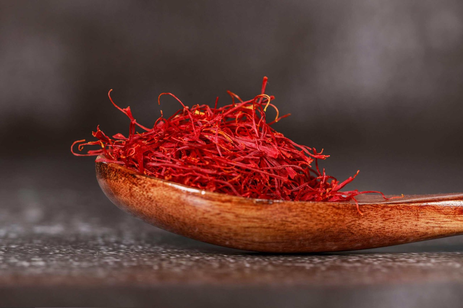 Persian or Iranian saffron on a wooden spoon